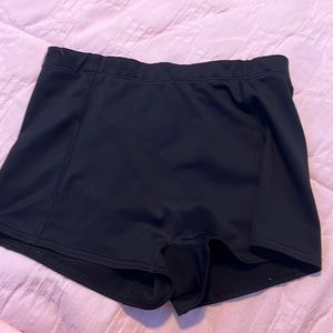 There spandex bag a large in kids but could fit as a women’s small